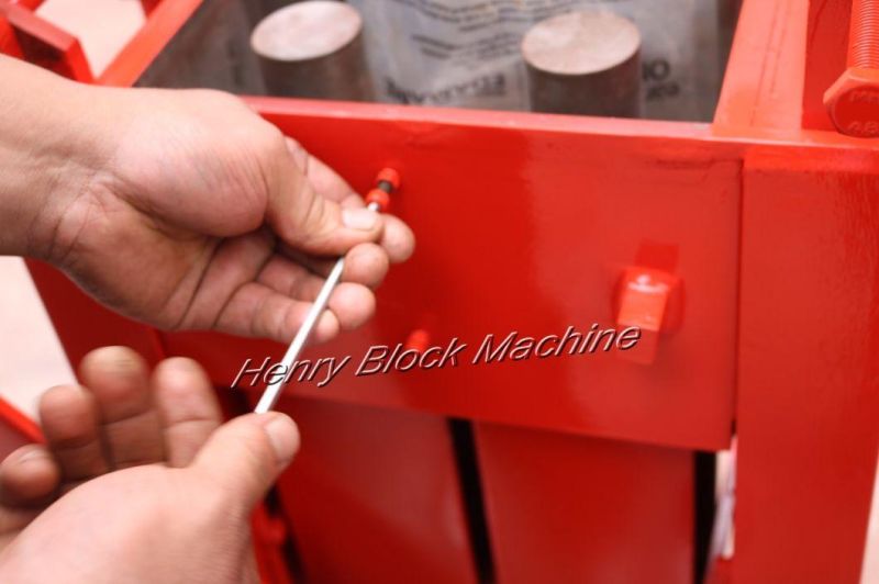Qmr2-40 Lego Manual Clay Soil Ecological-Brick-Machine Construction Machine for Sale