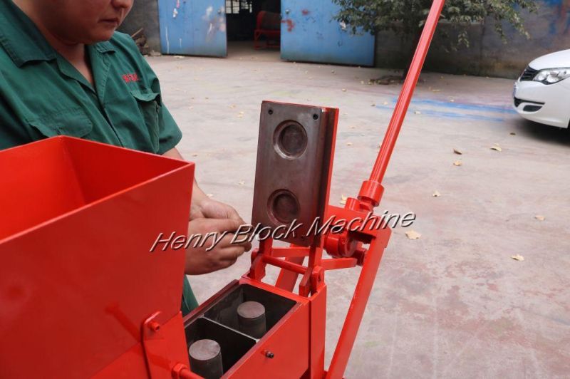 Qmr2-40 Lego Manual Clay Soil Ecological-Brick-Machine Construction Machine for Sale