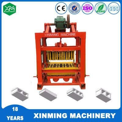 Xinming Widely Used Qtj4-40 Manual/ Semi Automatic Paver Block Machine with Electrical Vibration
