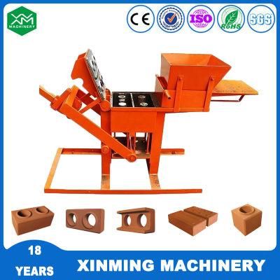 Low Price of Qmr2-40 Small Manual Soil Clay Mud Cement Interlocking Brick Making Machine Lego Brick Machine