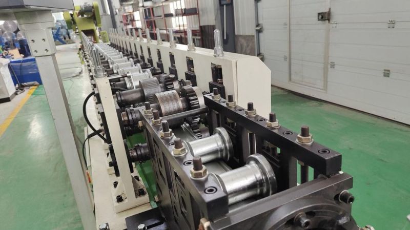 Galvanized Steel Roller Shutter Door Making Machine with Servo Cutting
