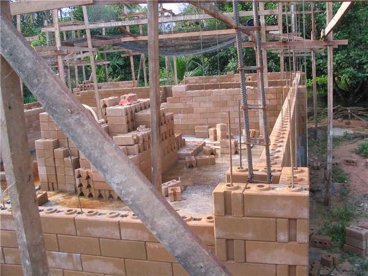 Lowest Price Qmr2-40 Clay Soil Earth Interlocking Block Making Machine in Construction