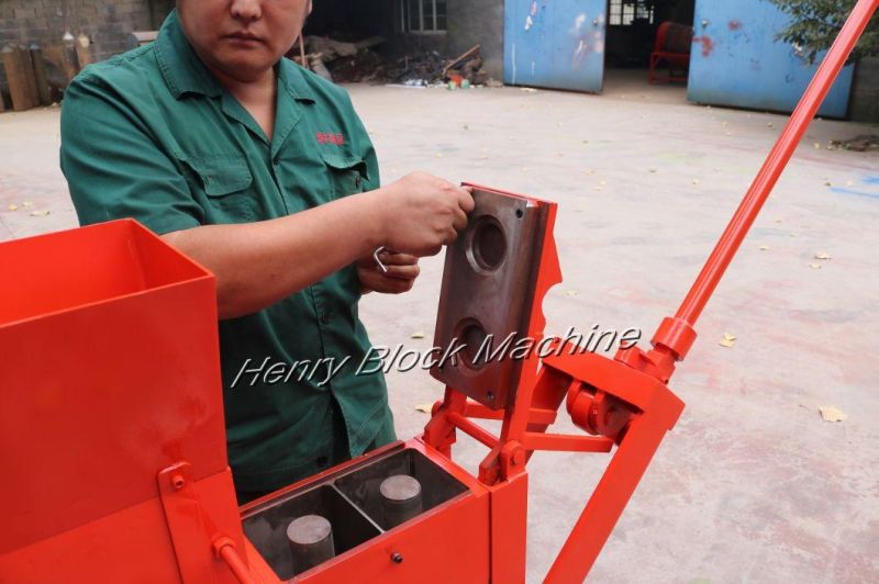 Qmr2-40 Lego Manual Clay Soil Ecological-Brick-Machine Construction Machine for Sale