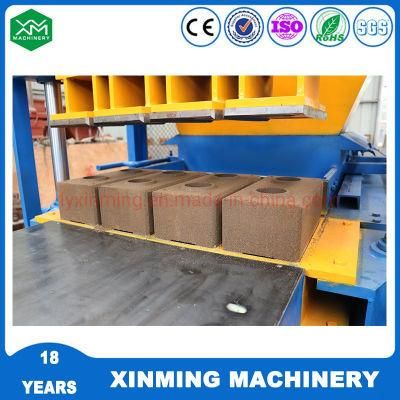 Xm4-10 Hydraulic Electric Motor Clay Soil Interlocking Block Making Machine with Small Investment