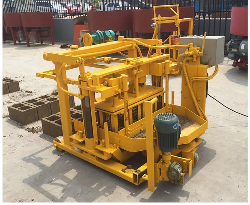 Manufacturer Supply Qt40-3A Small Egg Laying Mobile Sand Fly Ash Hollow Paving Curbstone Solid Cement Concrete Brick Making Machine with Block Mould for House