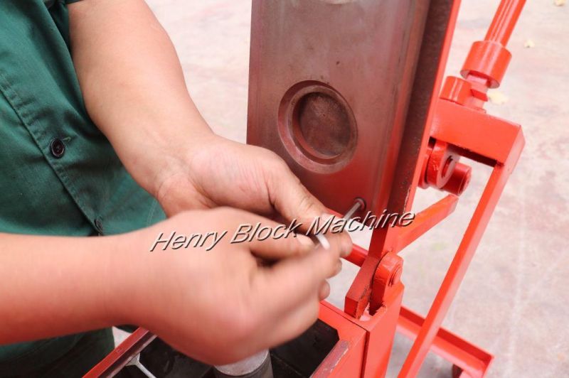 Qmr2-40 Lego Manual Clay Soil Ecological-Brick-Machine Construction Machine for Sale