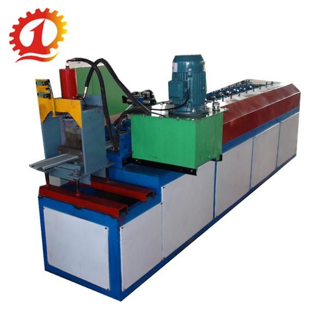 China Forward Roller Shutter Door Roll Forming Machine