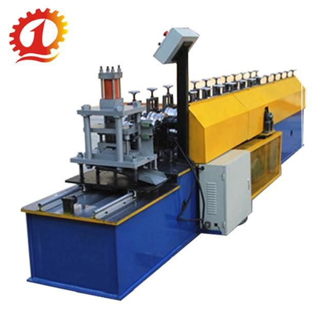 China Forward Roller Shutter Door Roll Forming Machine